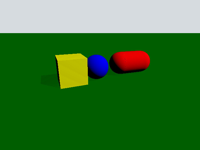 Screenshot of a green landscape with three different 3d objects next to each other