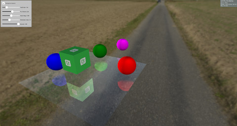 Reflective surface with colored spheres and floating objects