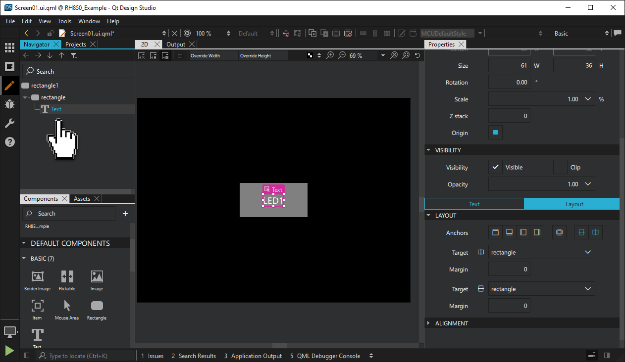 Dragging the existing Text component onto the new Rectangle.