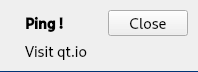 Desktop push notification titled Ping! with the text Visit qt.io and a Close button